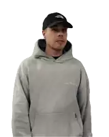 a man wearing a grey hoodie and a black hat is giving a thumbs up sign