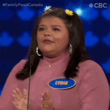 a lady with a name tag that says lydia on it