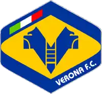 a blue and yellow logo for verona f.c. with a flag