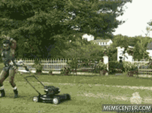 sexy man mowing the lawn