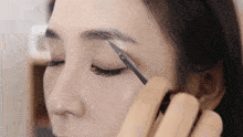 Trimming Eyebrows Tina Yong GIF - Trimming Eyebrows Tina Yong Cutting Eyebrows GIFs