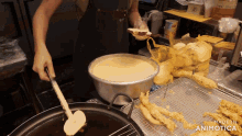 a person preparing food in a kitchen with the words made in animatica on the bottom right