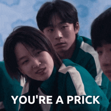 a group of people with the words you 're a prick written on the bottom