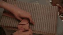 a close up of a cake in a box with a blurred background .