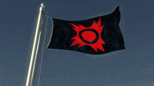a black flag with a red star and a circle in the middle