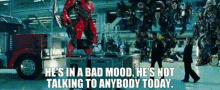 Transformers Dino GIF - Transformers Dino Hes In A Bad Mood GIFs