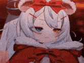 a girl with white hair and blue eyes is wearing a red cape and a red bow