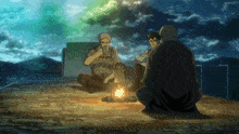 a group of people sitting around a campfire with one man drinking a cup of coffee