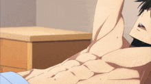 a close up of a man 's torso with sweat coming out of his armpit