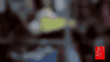 a blurry picture of a person with the number 48 on the bottom right corner