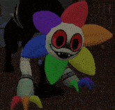 a cartoon character with a rainbow flower on its head is crawling on the floor