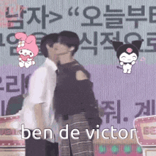 a man and a woman are kissing in front of a sign that says ben de victor in korean .