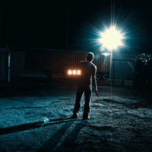 a man standing in front of a truck that says asz on it
