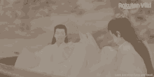 a couple in a boat with rakuten viki written on the bottom