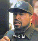 ice cube is wearing a hat that says f * k ai on it