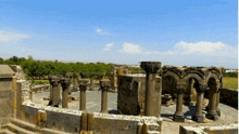 a group of stone pillars are lined up in a circle