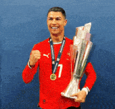 a man wearing a red jersey with the number 1 on it