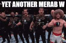 a man in a ufc uniform stands in front of a group of men with the caption yet another merab w