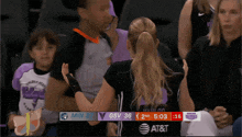 a basketball game is being played between the gsv and the at & t team
