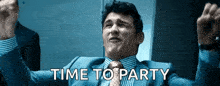 a man in a suit and tie is raising his arms in the air and says time to party