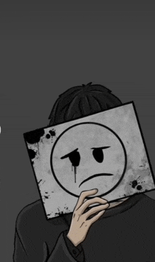 a man covering his face with a sad face on a piece of paper