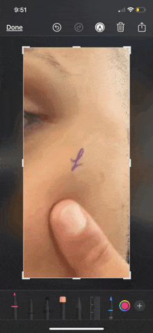 a screenshot of a person 's face with the time of 9:51 on the bottom