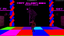a computer screen shows a stripper dancing in front of a sign that says hot alien sex night club