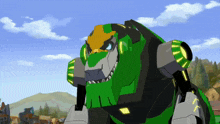 a cartoon drawing of a green and black robot with a yellow head