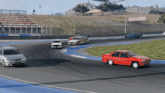 a red car is driving on a race track next to a white car