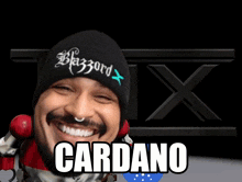 a man wearing a black beanie that says blazord x on it