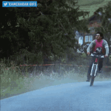 Ramcharan Magadheera GIF - Ramcharan Magadheera Cycling GIFs