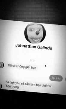 a black and white photo of a person 's face and the name johnathan galindo