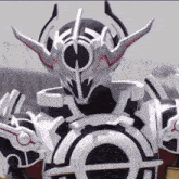 a close up of a black and white costume with a circle on the back