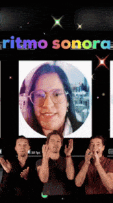 a group of people applauding in front of a screen that says " ritmo sonora "