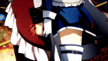 a woman in a blue skirt is holding a red item
