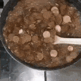Coins Boiling Cooking Spoon GIF - Coins Boiling Cooking Spoon GIFs