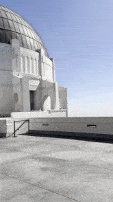 a large white building with a dome on top