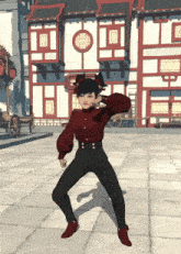 a girl in a red shirt and black pants is dancing in front of a building with a sign that says ' chinese '