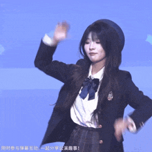 a girl in a school uniform with chinese writing on the bottom right