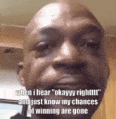a bald man is crying with a tear coming out of his eyes .