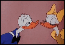 Donald Duck Rub Faces GIF - Donald Duck Rub Faces Rub Beaks GIFs