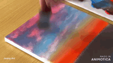a painting made in animatica is being painted on a canvas