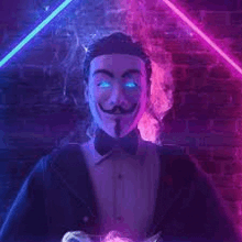 a man in a tuxedo and a mask with blue eyes is standing in front of a brick wall with neon lights .
