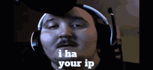 a man wearing headphones says " i ha your ip " in white letters