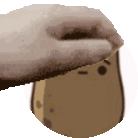a hand is holding a potato with a smiley face on it .