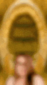 a blurred image of a person 's face with a circle in the middle