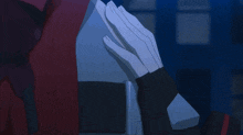 a close up of a person 's torso with a red jacket