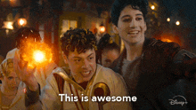 a disney + ad shows a group of people holding fire