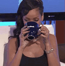 When It Gets Awkward GIF - Rihanna Sipscoffee Sips Tea GIFs
