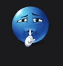 a blue smiley face is holding a finger to his mouth .
